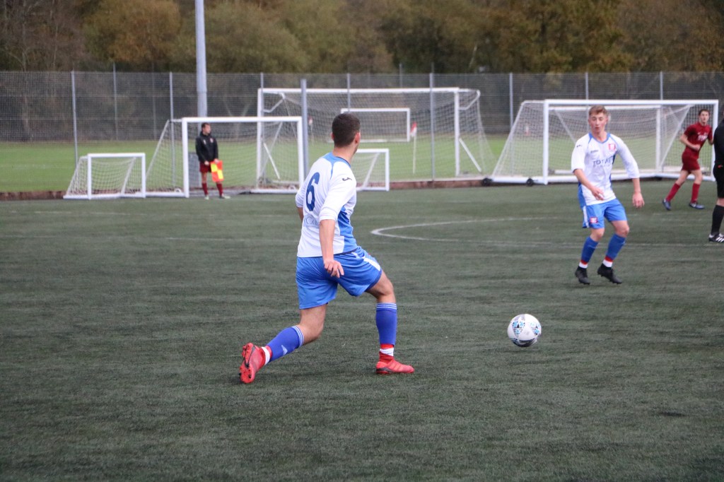 A person in a green field

Description automatically generated