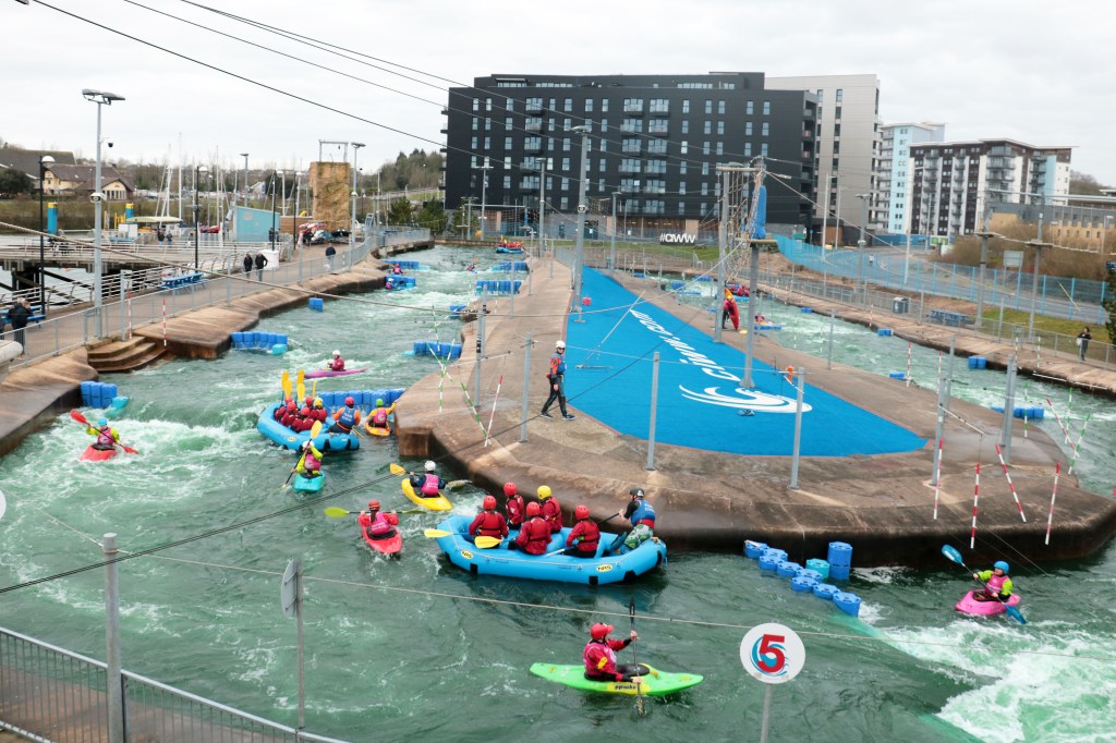 A group of people in a swimming pool

Description automatically generated